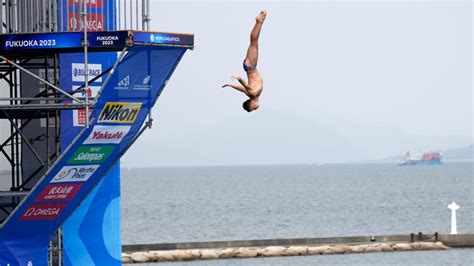 Dare to dive from 27 meters or 90 feet? Impact is like a car crash at 85 kph — 50 mph