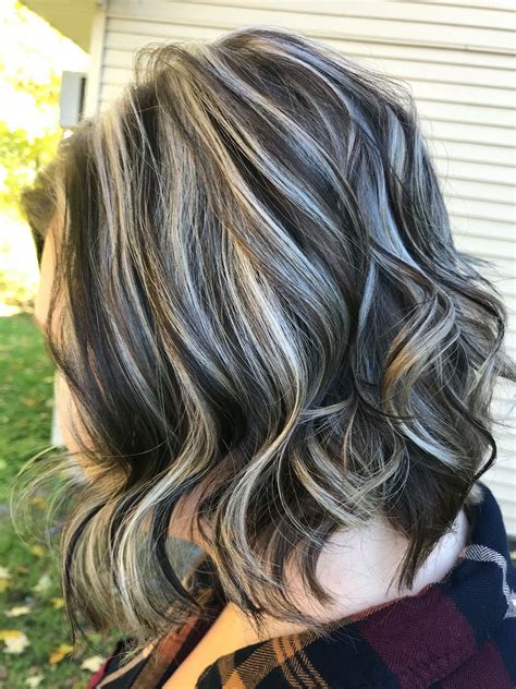 Dark brown hair with blonde highlights and black lowlights. With multitone lowlights at the roots and frosty blonde color at the ends, dark roots blonde hair may appear appealing. Mushroom Brown Hair with Curls Consider semi-ashy tones in your highlights and lowlights if you like a neutral hair … 