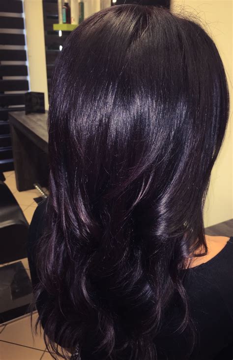 Dark dark purple hair. 3. Smoky Amethyst. jacobhair on Instagram. This unique take on black and purple hair takes the dreamy color of amethyst and adds a base of black for a a fantastic result. Subtle variations of darkness in the purple create the gem-like look. And the black used is a lighter tone that contributes to the gentle elegance of the style. 