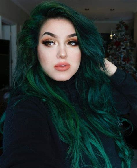 Dark green hair color. Your base color is SUPER important since it affects the appearance of tones. If you apply blue pigment on top of a yellow-toned blonde, the results can veer toward a more teal or green hue. The whiter the hair, the truer the color tone. Before you color your hair blue, watch a tutorial by Mykey O’Halloran on how to avoid green tints! 