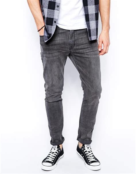 Dark grey jeans. HIGHLANDER. Men Tapered Fit Mid Rise Dark Grey Jeans. ₹763. ₹ 2,699. 71% off. KOTTY. Women Slim High Rise Dark Grey Jeans. ₹459. 