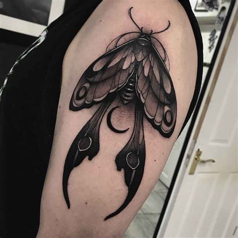 The moth tattoo looks quite dark and gloomy but it is definitely wor