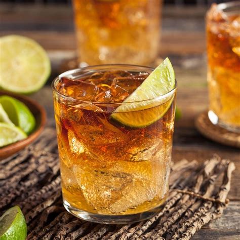 Dark rum mixed drinks. Rum is made using only three ingredients: molasses from sugarcane, yeast and water. Ingredients are fermented, then distilled, aged, filtered and blended. 