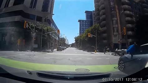 Dash cam captures cyclist getting run over by car on Yonge Street