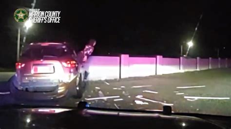 Dashcam video shows reckless driver head-butting car window following pursuit to escape deputies in Ocala