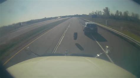 Dashcam video shows wheel striking transport truck on QEW highway
