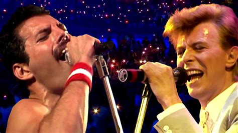 David Bowie and Freddy Mercury singing "Under Pressure," a …