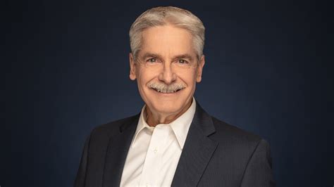 Photograph of NBC 5 meteorologist, David Finfrock, posing for a