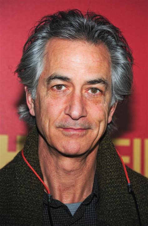 David Russell Strathairn (/ s t r ə ˈ θ ɛər n /; born January 26, 1949) is an American actor. Known for his leading roles on stage and screen, he has often portrayed historical figures such as Edward R. Murrow , J. Robert Oppenheimer , William H. Seward , and John Dos Passos .