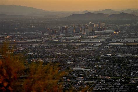 Day and night, Phoenix has sweltered from heat that will break a record for American cities