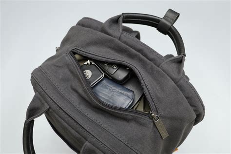 Day owl backpack. The Day Owl Backpack Pro is designed to carry you through your day, wherever it may take you. Every detail and material has been carefully curated to create the most functional backpack made in the most sustainable way. Details. The Backpack Pro is 21 Liters with dimensions of 12" x 5" x 17". 