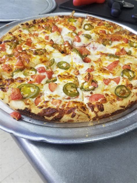 Deanos pizza. Topped with green peppers and purple onions on our one-of-a-kind Parmesan pizza sauce. Choose your closest location! Bertrand 305 Bertrand Dr. Lafayette, La 70506. South 2312 Kaliste Saloom Rd. Lafayette, La 70508. Henderson 1046 Henderson Hwy Breaux Bridge, La 70517. Change your Location Henderson; 