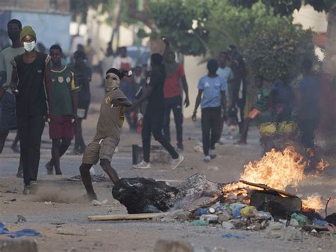 Death toll from Senegal protests rises to 15 as opposition supporters clash with police