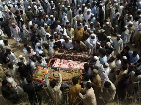 Death toll in Pakistan suicide bombing rises to 54 as families hold funerals, police say
