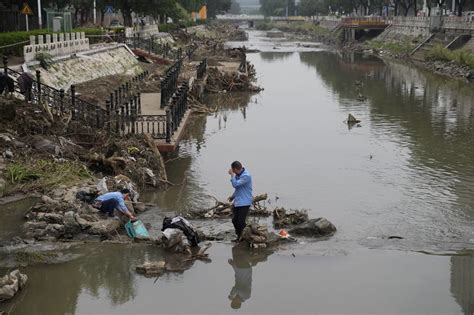 Death toll in recent Beijing flooding rises to 33, with 18 still missing