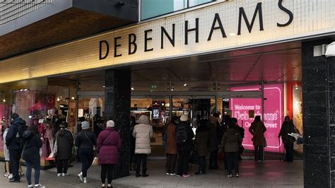 Debenhams. From 1985 to 1998, Debenhams was part of the Burton Group. A fireman hoses down smouldered debris inside a Debenhams store in Luton, Bedfordshire, after … 