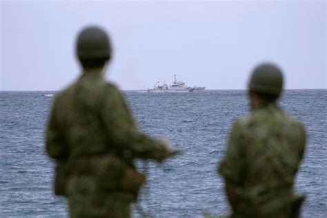 Debris found in search for Japanse army copter with 10 crew