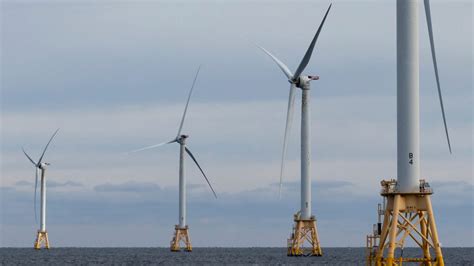Decades after Europe, turning blades send first commercial offshore wind power onto US grid