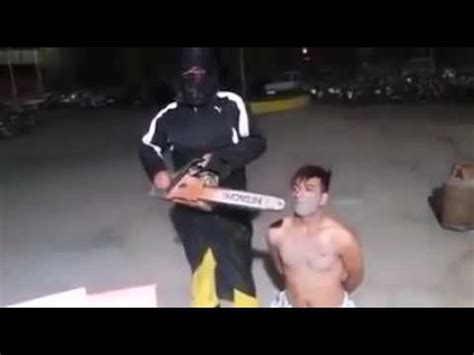 Decapitated with chainsaw. Lol. Funny.. Watch till the end 