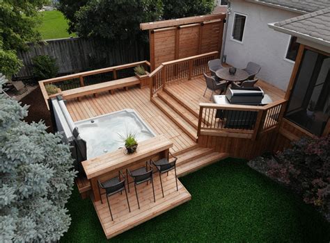 Deck designs with hot tub. This deck design features a 18' x 14' primary deck attached to the house which steps down to an exaggerated landing. ... This lower deck functions as access to a recessed hot tub and a comfortable landing to break the stairs into reductive sections. Previous Next. SELECT A SIZE: 33' x 29' 33' x 29' Details for Deck … 