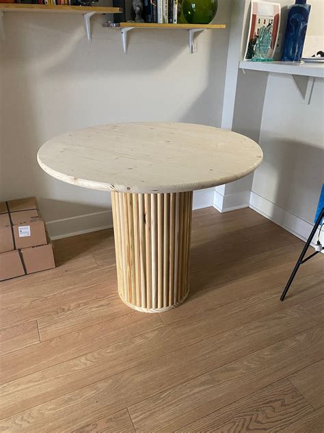Decocore white oak herringbone.  Check out our fluted round dining table ba...