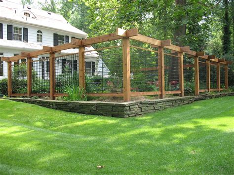Deer fence for garden. Staple a section of chicken wire or mesh to the door frame. Attach the 2 by 4 in. and 2 x 6 in. trim to the door frame with 2.5-inch screws. Attach the cross support on the interior of the door. Use 2 1/2-inch exterior wood screws to attach the gate hinges and gate handle. Attach the door to the frame of the enclosure. 