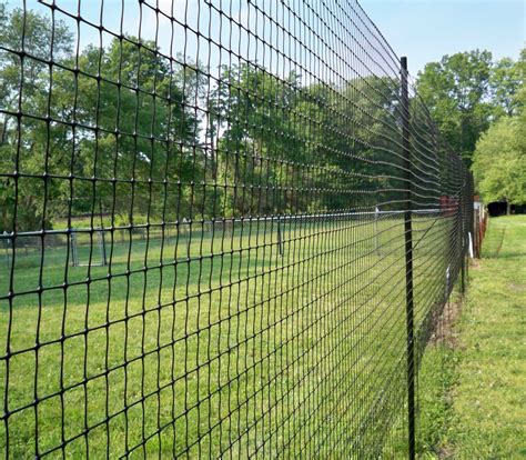 Deer fences. #84: We needed a quick, inexpensive, and effective solution to keep deer from getting in our garden and this T-post fence with 30# fishing line idea we found... 