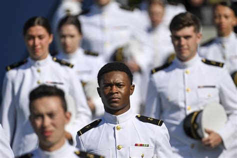 Defense secretary tells Navy graduates they are ready to serve