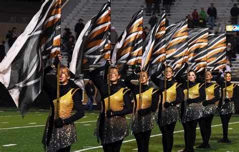 By its very definition, “Color guard uses various equipment, such as flags, rifles, and sabres, along with dance, to express dynamic passages in the music .... 
