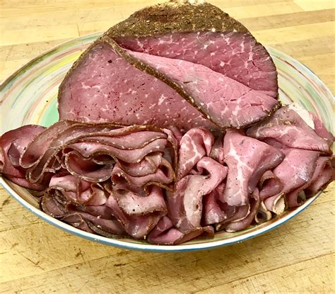 Deli cut. Preheat the oven to 400°F/ 200°C. Line the baking sheet with aluminum foil and place a roasting rack on top. Place the beef with the fat side up on the rack. Roast for about 12-14 minutes per pound/ 450 g or until the internal temperature reaches 122-127°F/ 50-53ºC for medium-rare (Notes 4,5). 