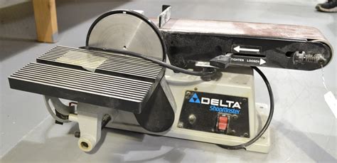 Cast-aluminum table with miter gauge slot tilts 45º for bevel sanding and may be used on either the belt or disc unit. Contents: Delta Model 31-695 6" Belt / 9" Disc Sander with a 1 HP, 120 Volt, induction motor; 80-grit abrasive belt, 80-grit abrasive disc, stand, tilting table, backstop and T-handle wrench. For wood only.. 