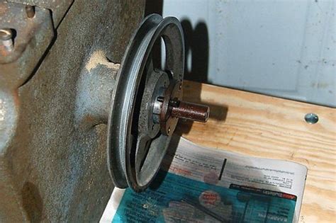 Delta band saw wheel and bearing removal - LumberJocks.com