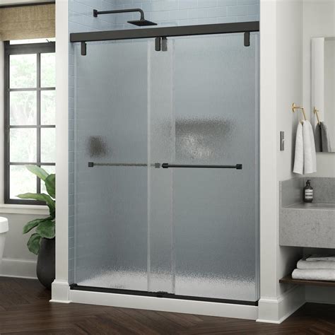 Delta mod shower door. Frameless shower door glass is generally 1/4" or greater in thickness. Comes in a wide range of options that include textured glass, clear glass or glass that includes some type of silk-screened pattern. The 1/4" frameless glass gives the shower a more open and luxurious look. 