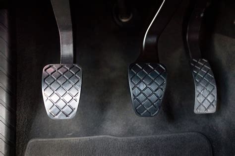 Check traffic in both mirrors before slowing down; Let up on the accelerator; Tap the foot brake lightly; Gradually press down on the foot-brake pedal. Ease up on the brake just before stopping. Leave the selector lever in drive if you plan to start moving again immediately. Otherwise shift to park. . 