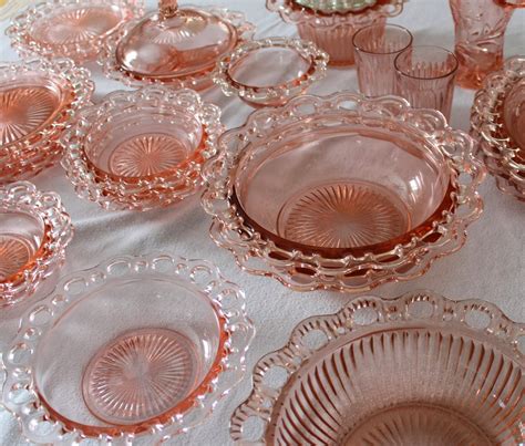 Depression glass pink. Royal Lace is most often thought of as the most desired and rare pattern of depression glass. This pattern was created in pink, crystal, and green, but most interestingly it was made in cobalt blue. The blue glass was only produced for five years, making it the more rare type of the already valuable Royal Lace pattern. 