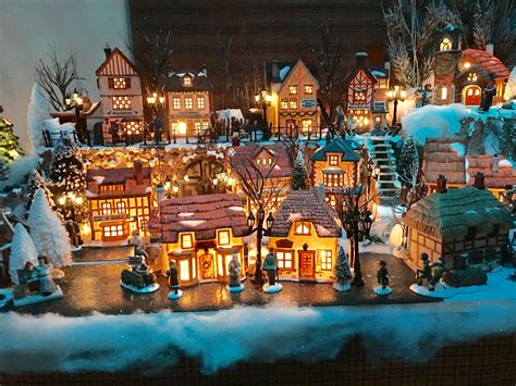 Each year Ruth sets up her Department 56 Dickens' Village in her home.She has 3 different locations or settings complete with street and home lights and star.... 