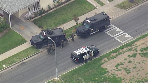 Deputies shoot armed suspect in East L.A.