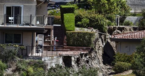 Destructive Southern California landslide slows but more homes ordered evacuated as sewer breaks