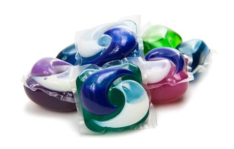 Detergent pod. The warm water will help to dissolve any of the membrane from the pod that may be lingering in the fibers, and the force of the water will help to push out the staining from the detergent. If it ... 