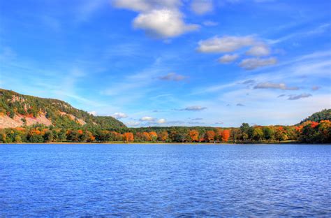  Devil’s Lake is a shore accessible fresh water dive site, located at s5780 state rd. 123, Baraboo, WI 53913. This dive site has an average rating of 3.38 out of 5 from 13 scuba divers. The maximum depth is 26-30ft/8-9m. The average visibility is 11-15ft/3-5m. Max Depth: 45’ +or-. Avg Dive Depth: 20 - 30. . 