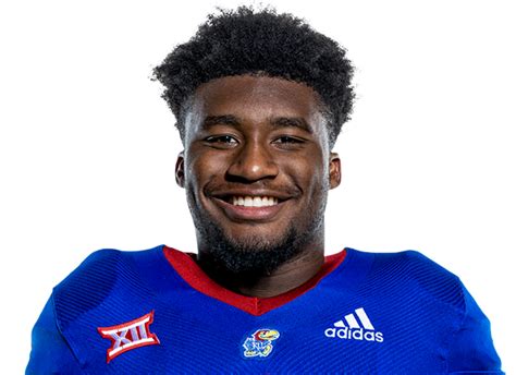 Career history. College. Kansas (2021–present) Bowl games. Liberty Bowl ( 2022) High school. Lawrence (KS) Stats at ESPN.com. Devin Neal (born August 12, 2003) [1] is an American football running back for the Kansas Jayhawks . . 