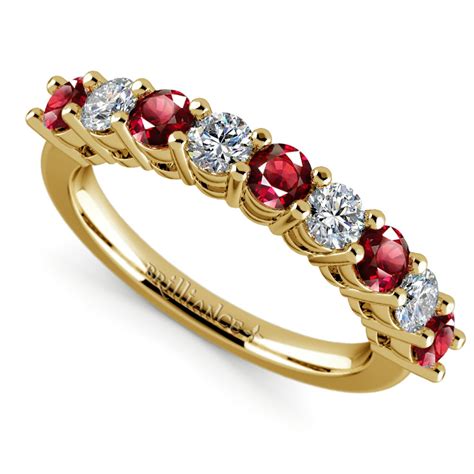Diamond and ruby ring. 18ct YG Diamond & Ruby Ring ... A forever piece. This lovely ring features a large oval ruby in it's centre weighing 2ct surrounded by ten brilliant cut diamonds ... 