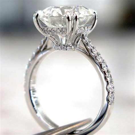 Diamond engagement rings 1.5 carat. Sep 14, 2023 ... Elegance and style embodied in this natural 1.51 carat oval cut diamond engagement ring. Set in stunning two tone 18KT gold with a custom ... 