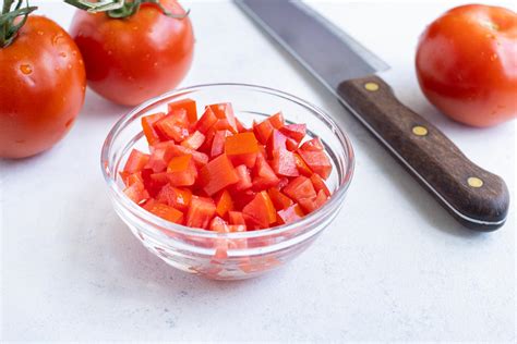 Diced tomatoes. Sep 6, 2018 · Transfer your diced tomatoes (and their juices) to a large pot, and bring them to a boil over medium-high heat. Then, reduce the heat to a simmer, and cook for around 30 minutes, stirring regularly to prevent sticking and burning. Your diced tomatoes are done, when the juices start to thicken. 