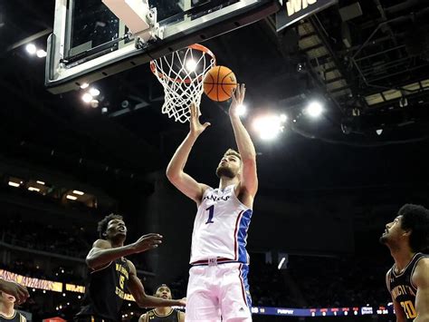 Dickinson’s double-double helps send No. 2 Kansas to 86-67 win over Wichita State