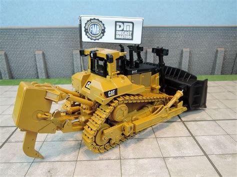Diecast masters. Diecast Masters manufactures a wide range of Cat® scale construction models. With multiple Caterpillar scale models, we offer an unmatched selection of high-quality replicas that accurately represent nearly every machine category. Experience the precision and attention to detail that these models are known for. Shop ou 