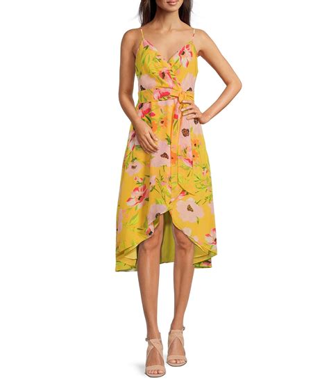 Vince Camuto Sleeveless Floral Chiffon Halter Ruffle Neck Smocked Waist Midi Dress. Permanently Reduced. Orig. $168.00. Now $58.80. ( 1) Shop for vince camuto …. 
