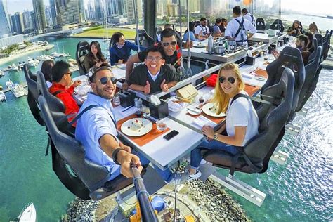 Dinner in the sky dubai. Enjoy a unique dining experience at 50 meters high in the sky of Dubai, with a table suspended by a crane and a view of the city skyline. Book your seat now for a … 