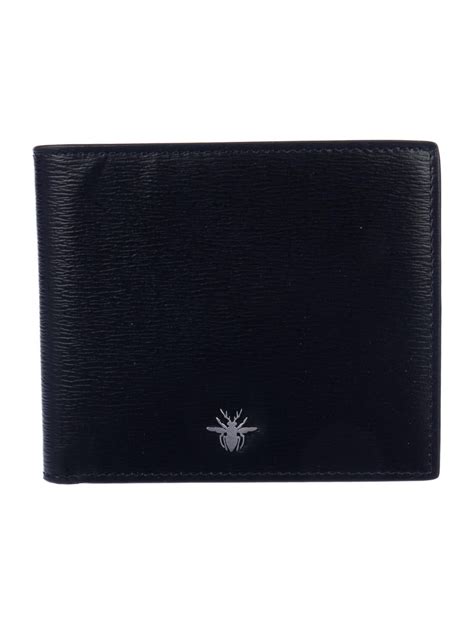 Dior men wallet. CACTUS JACK DIOR Wallet. Black Grained Calfskin with Embroidered Signature. S$ 920.00. #New. Compact Wallet. Dior Gray Grained Calfskin with 'Christian Dior 1947' Signature. S$ 870.00. #New. Wallet. 