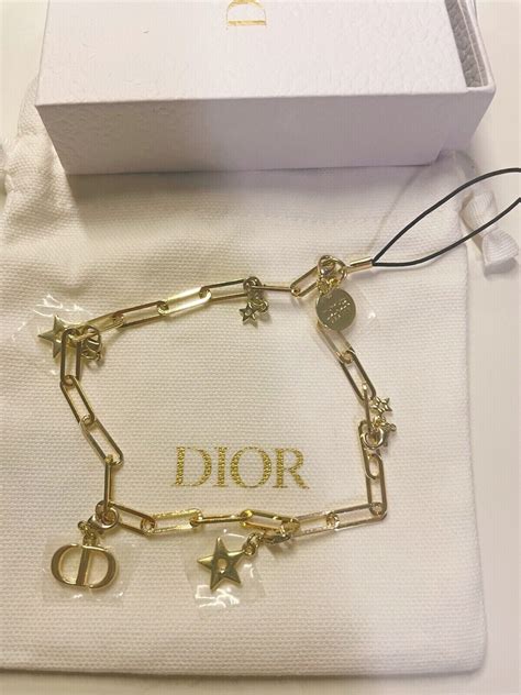 Dior phone charm. Dior gift with purchase phone charm or new member sign up gift. Amazon chain necklace Can be a nice fancy gift if you buy a more expensive chain. 